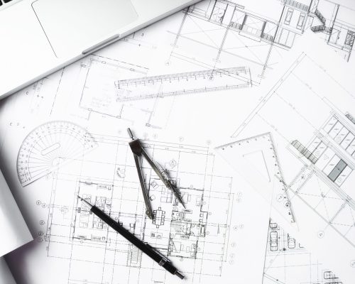 Image of engineering objects on workplace top view.Construction concept. Engineering tools.Vintage tone retro filter effect,soft focus(selective focus)